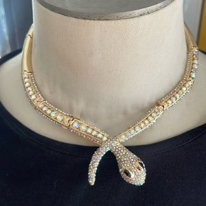 Natasha Couture gold rhinestone snake necklace